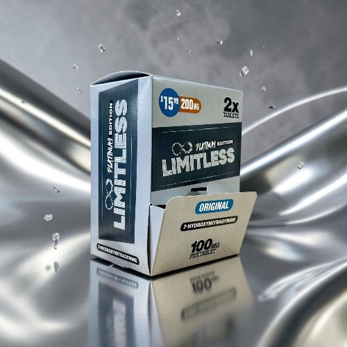 Box of Limitless product on a reflective surface with water droplets.