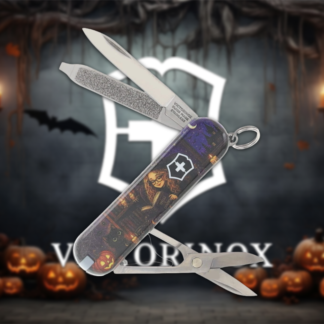 Victorinox Swiss Army knife with Halloween-themed design and background.