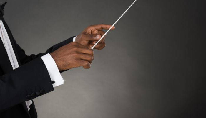 Music conductor in tuxedo