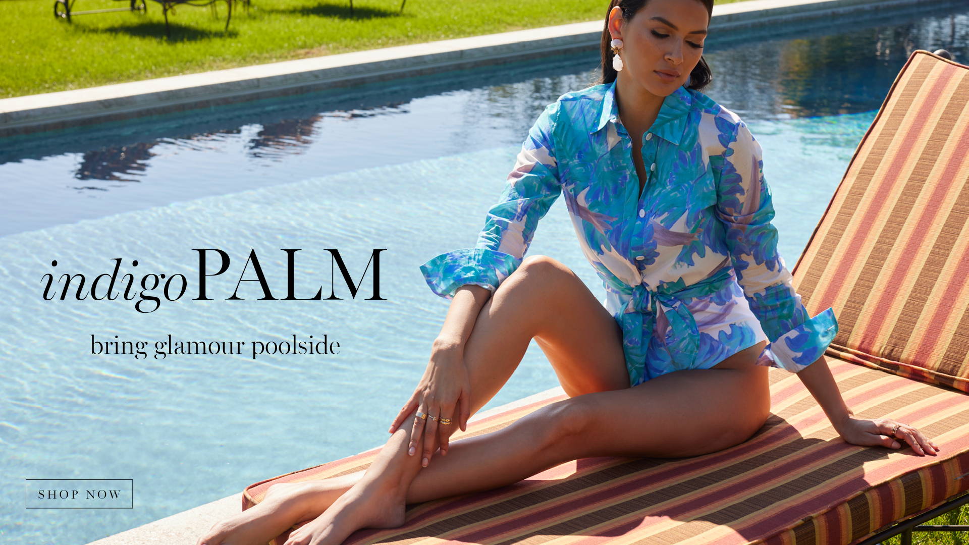 indigo PALM | Bring glamour poolside | Woman wearing blue palm leaf prtined cotton shirt over blue printed swim suit by Ala von Auersperg and Cover Swim for 2024