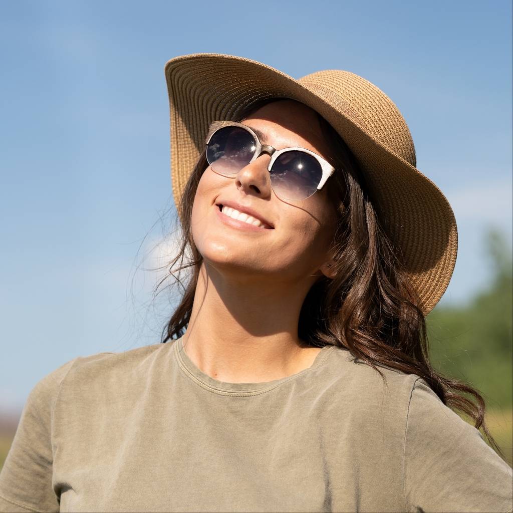 Woman with Round Face Shape wearing Tom & Cat, Round Bamboo Wood Sunglasses 