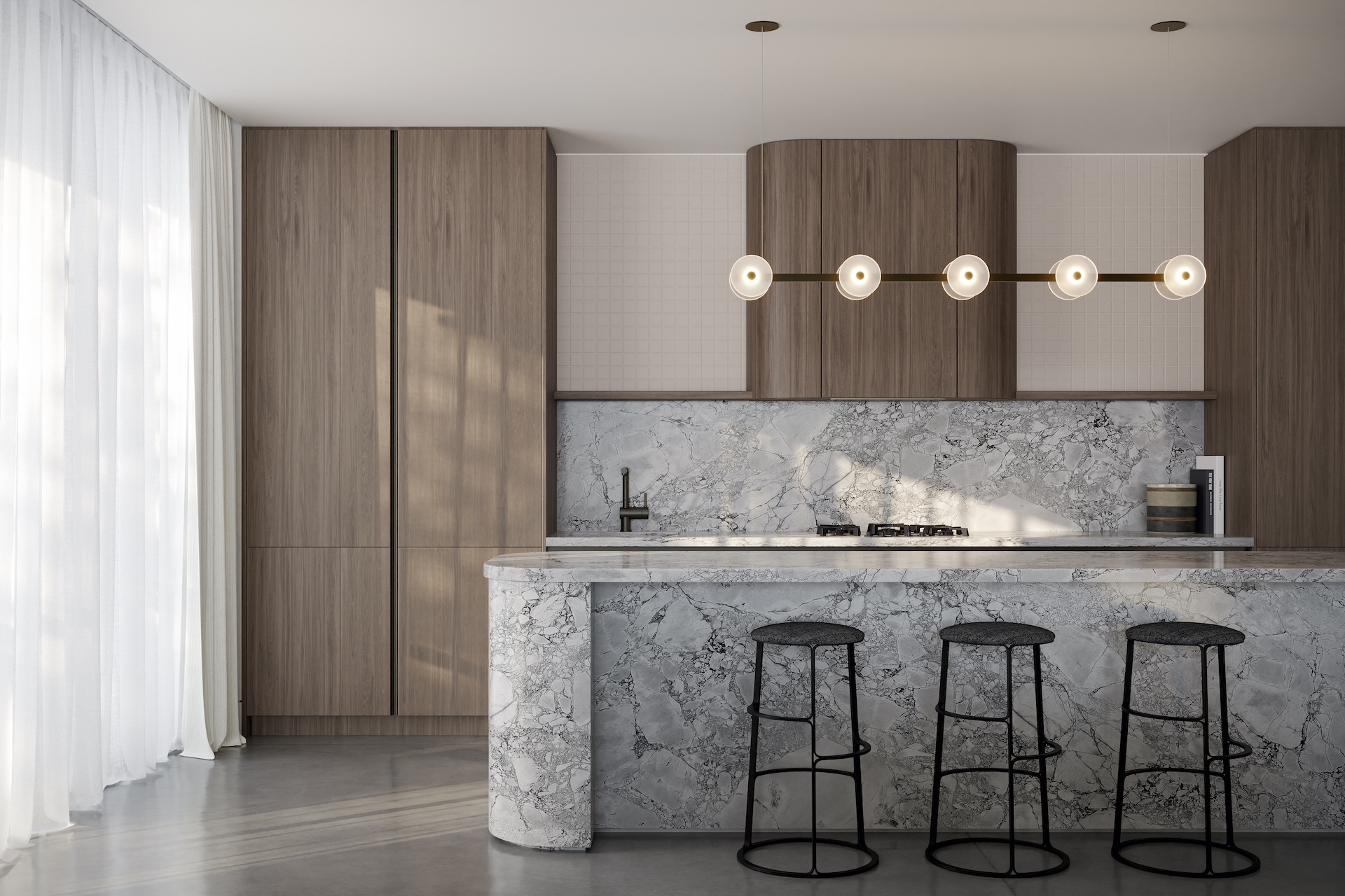 Modern kitchen with marble island and frosted glass linear bar pendant