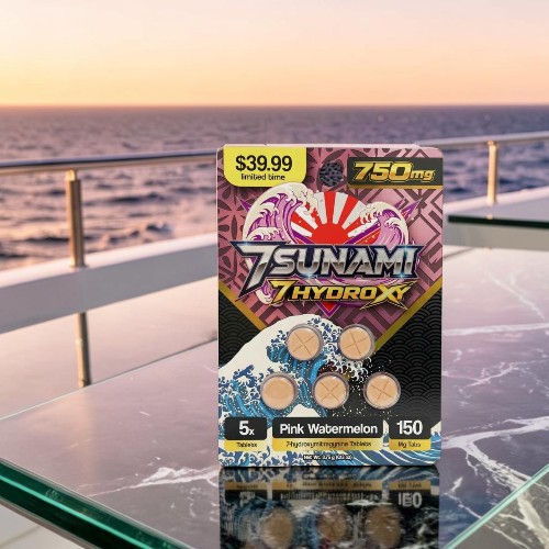 Box of 7HYDROX dietary supplement on a table with a sunset background.