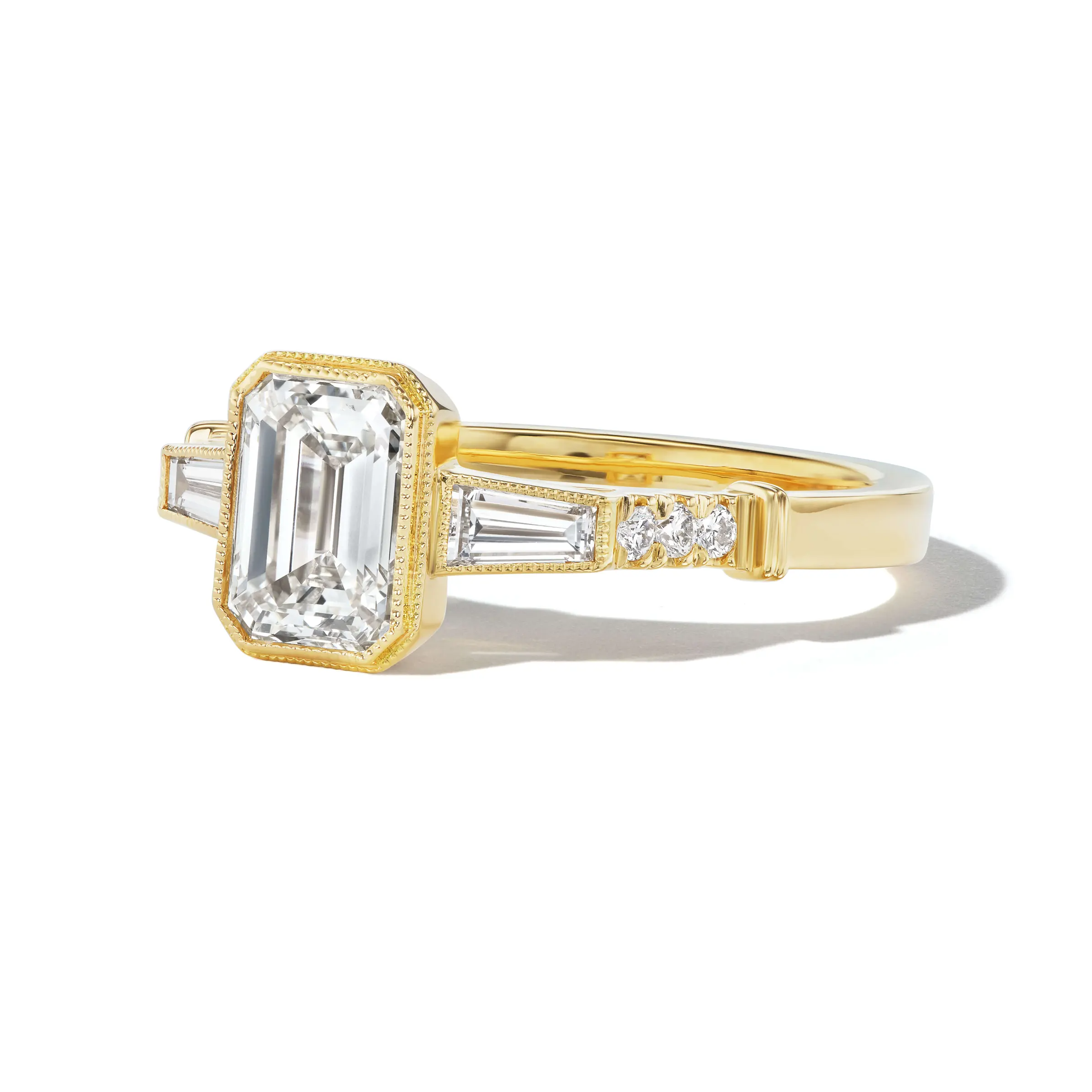 emerald-cut-engagement-ring-with-baguettes