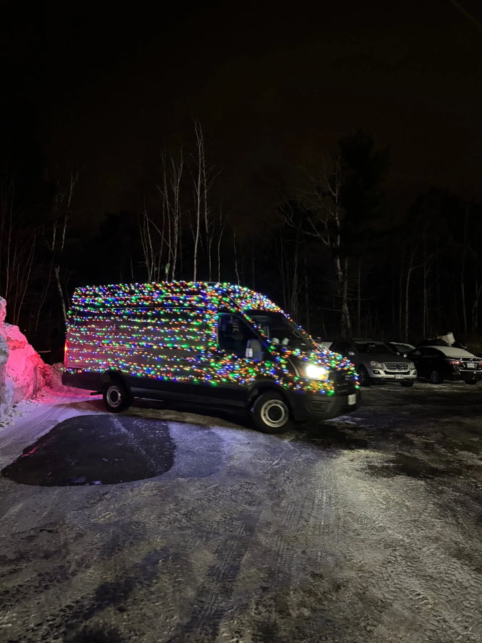 Ford Transit covered multicolor Christmas lights night snowy slush headlight glow Taylor's 228H gallery photo 4