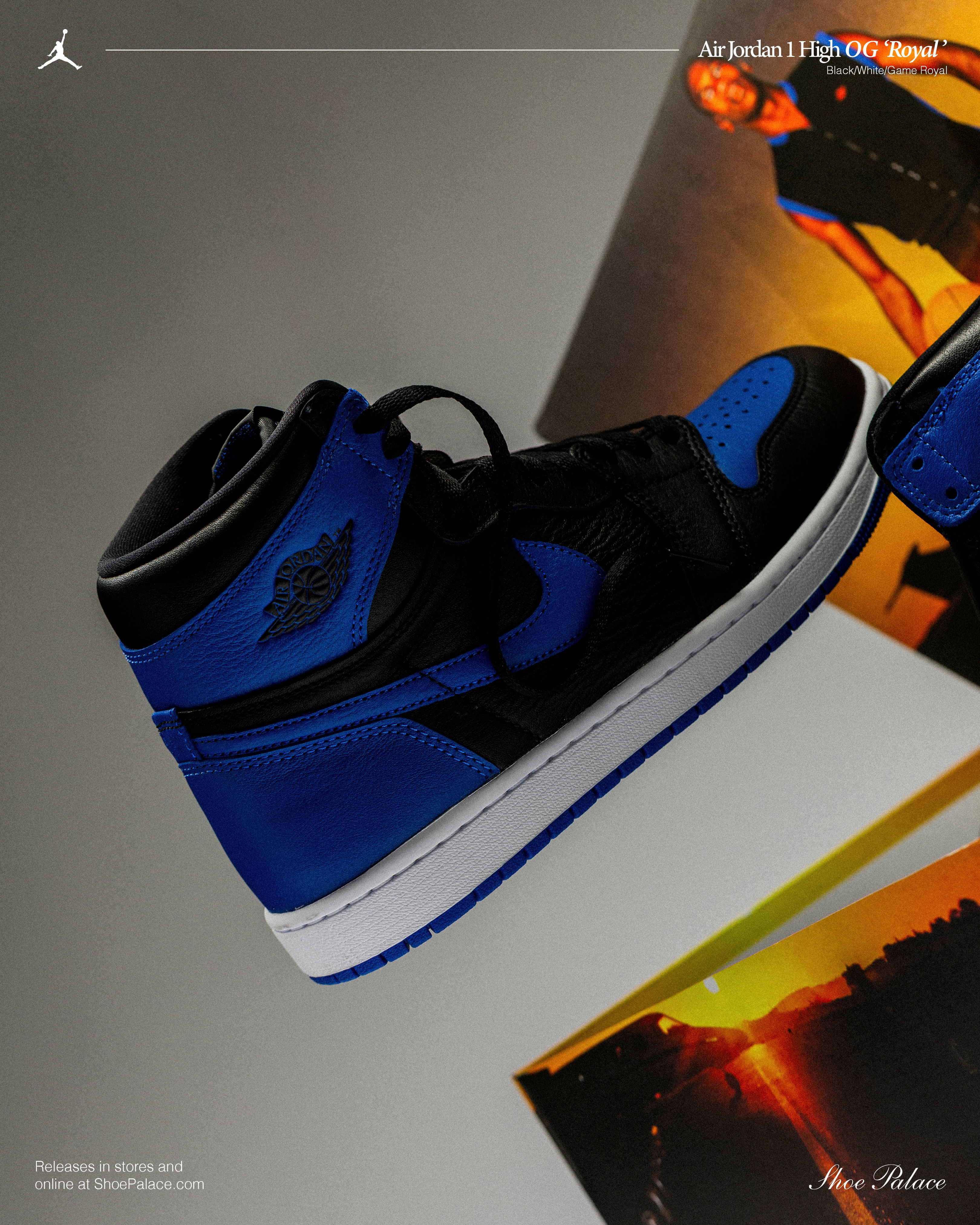 A pair of black and blue high-top sneakers on a colorful background.