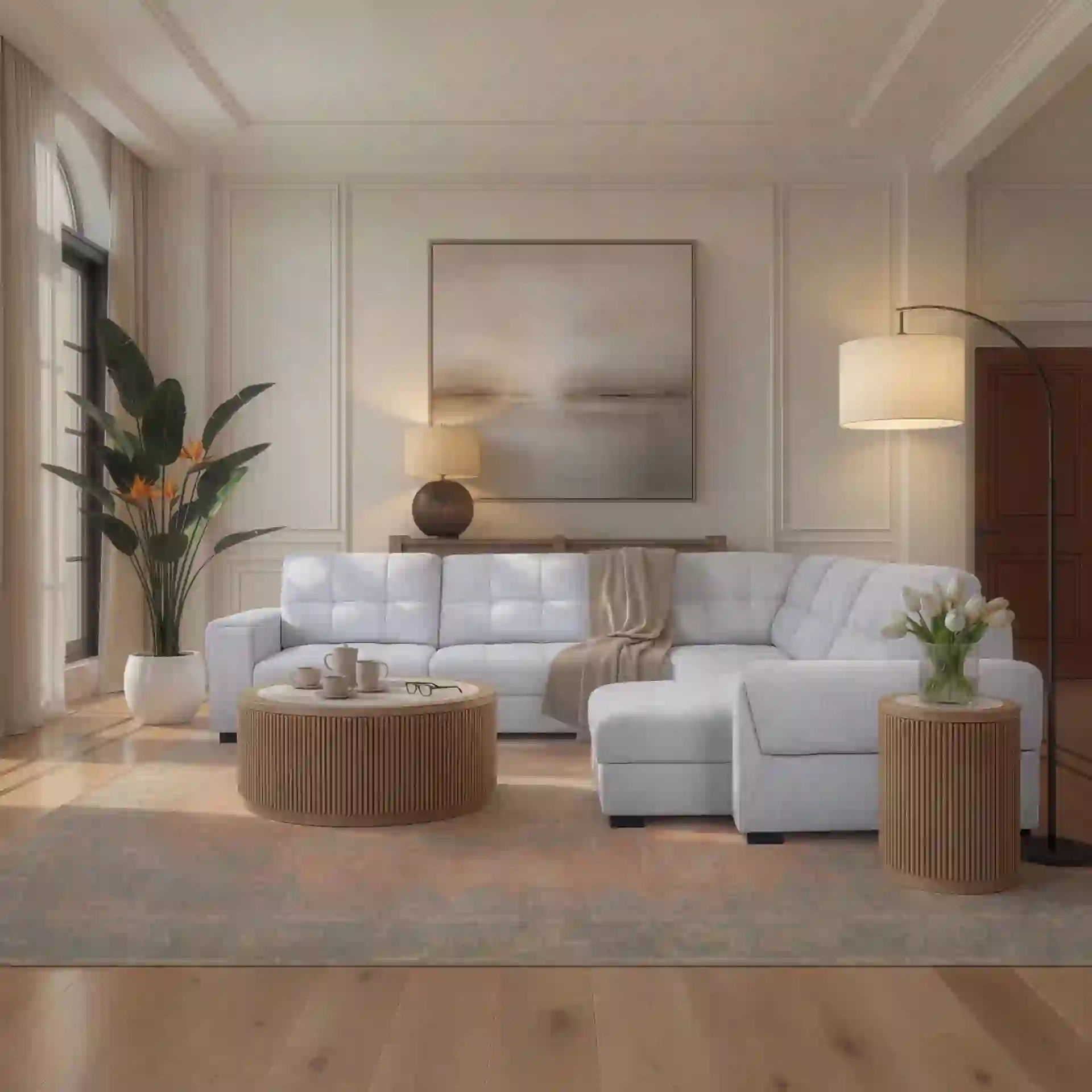 Modern living room with white sectional sofa, round coffee table, and plants.