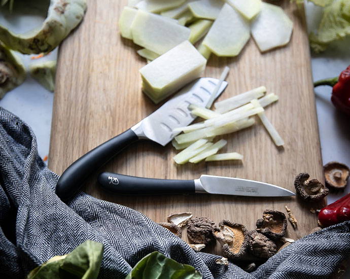 Signature Knives on chopping board