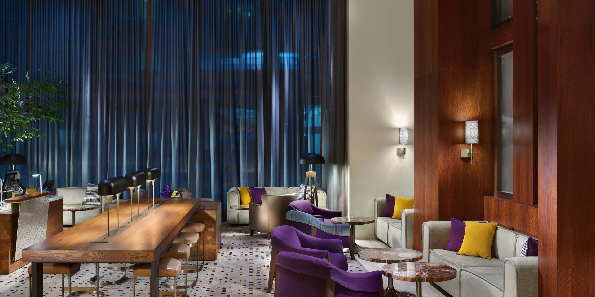 Modern lounge with comfortable seating and elegant decor.