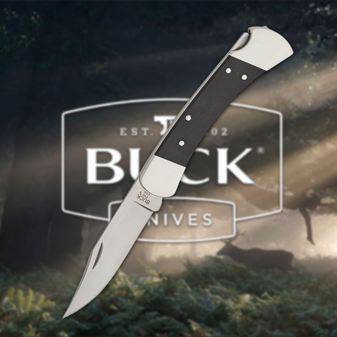 Buck knife with a sleek design against a natural background.