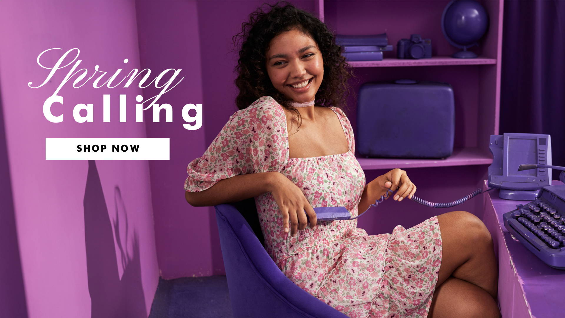 Spring is calling, pink and green floral dress with a pink choker, girl answering phone in purple room.
