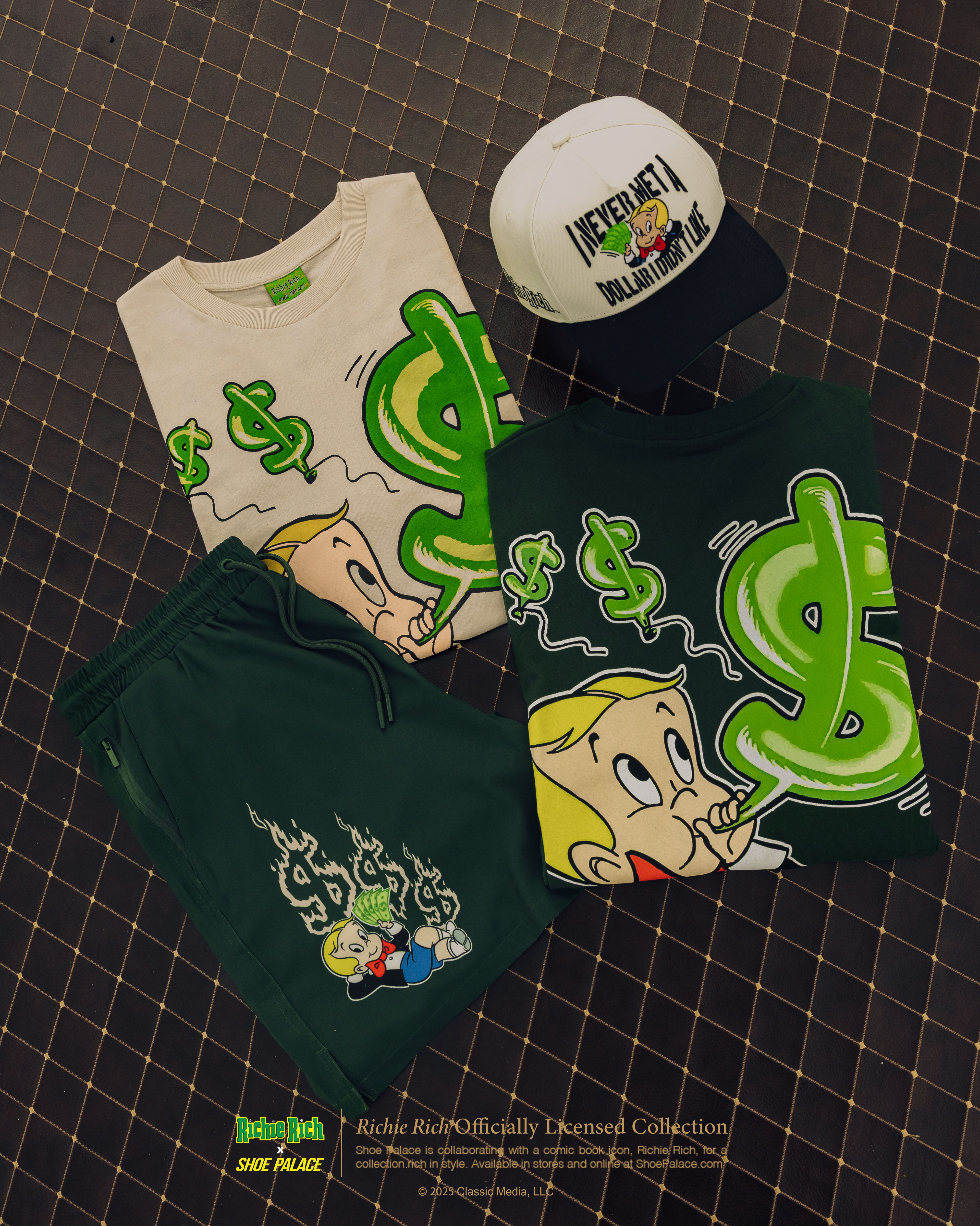 Clothing items featuring cartoon characters and dollar signs on a patterned surface.