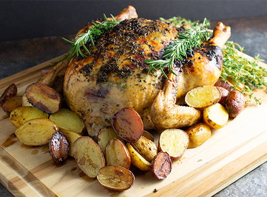 Roasted Honey Glazed Chicken with Lemon-Sage Butter and Creamer Potatoes