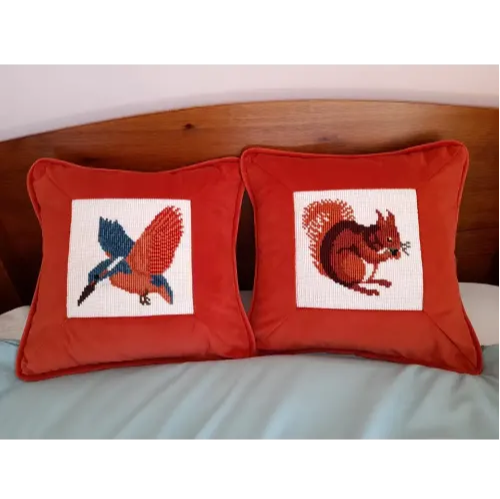 Bird and squirrel needlepoint pillows