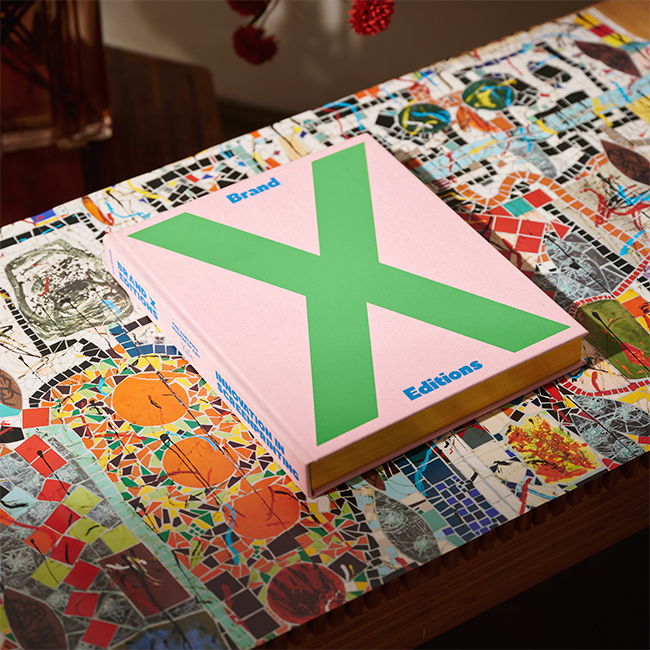 A pink book with a green 
