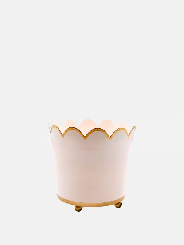 A small gold tipped scalloped edged planter in rose pink.