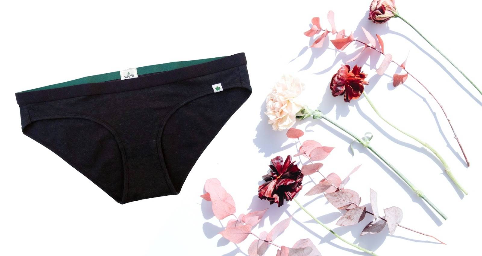 Wama Underwear and Red flowers representing how to get blood out of underwear