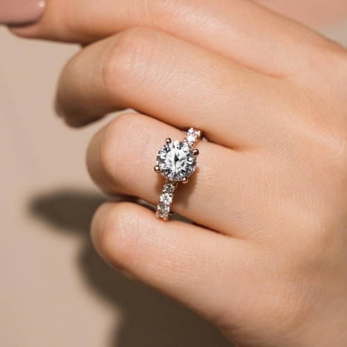 women wearing a diamond accented engagement ring featuring lab grown diamonds by MiaDonna