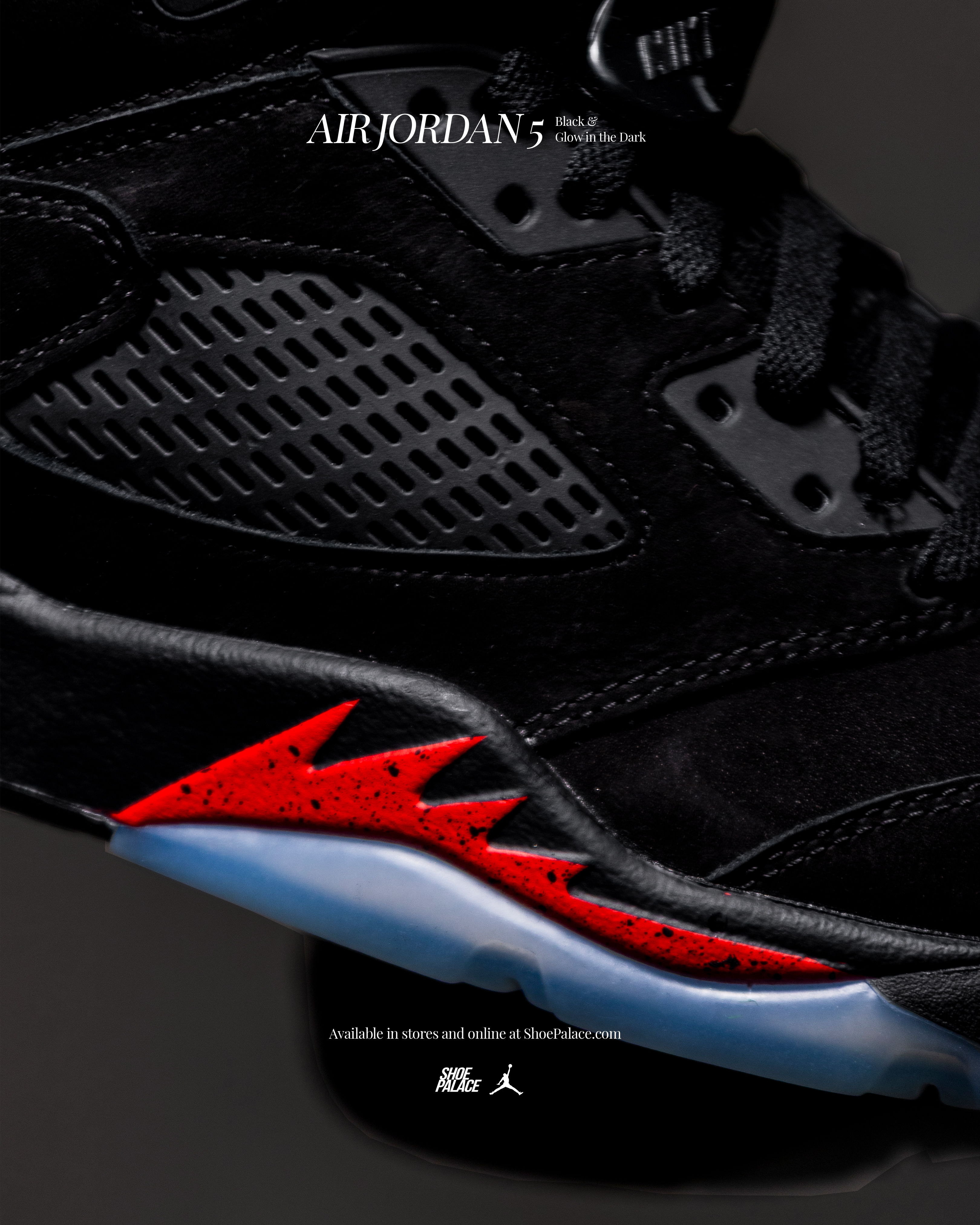 Close-up of an Air Jordan 5 sneaker in black and red.