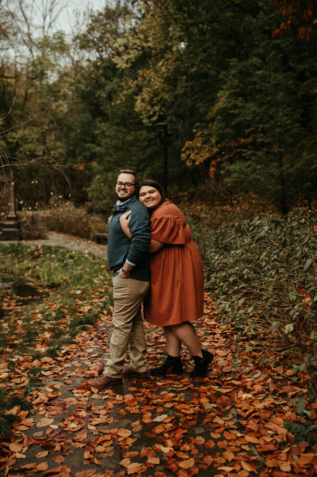 Henne Engagement Ring Couple Jesse and Katie Share a Hug in the Woods