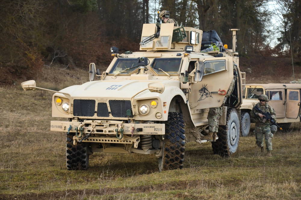 U.S. Soldiers assigned to Delta Company, 91st Brigade Engineer Battalion begin movement in a OshKosh M-ATV during Combined Resolve XV at the Hohenfels Training Area in Hohenfels, Germany, Feb. 21, 2021. Combined Resolve XV is a Headquarters Department of the Army directed multinational exercise designed to build 1st Armored Brigade Combat Team, 1st Cavalry Division's readiness and enhance interoperability with allied forces to fight and win against any adversary (U.S. Army photo by Spc Esmeralda Cervantes)