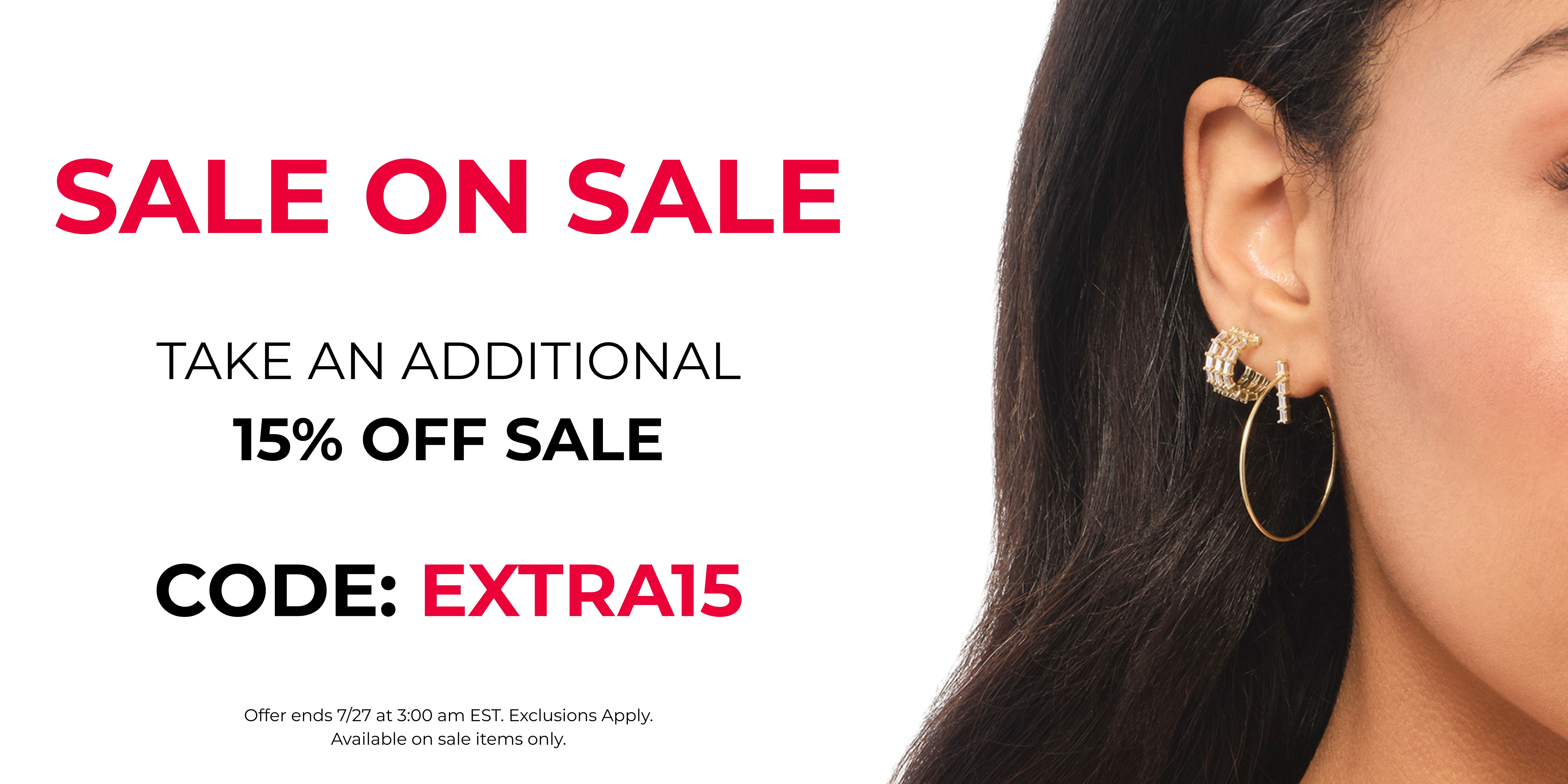 Woman with earrings promoting a sale with discount code.