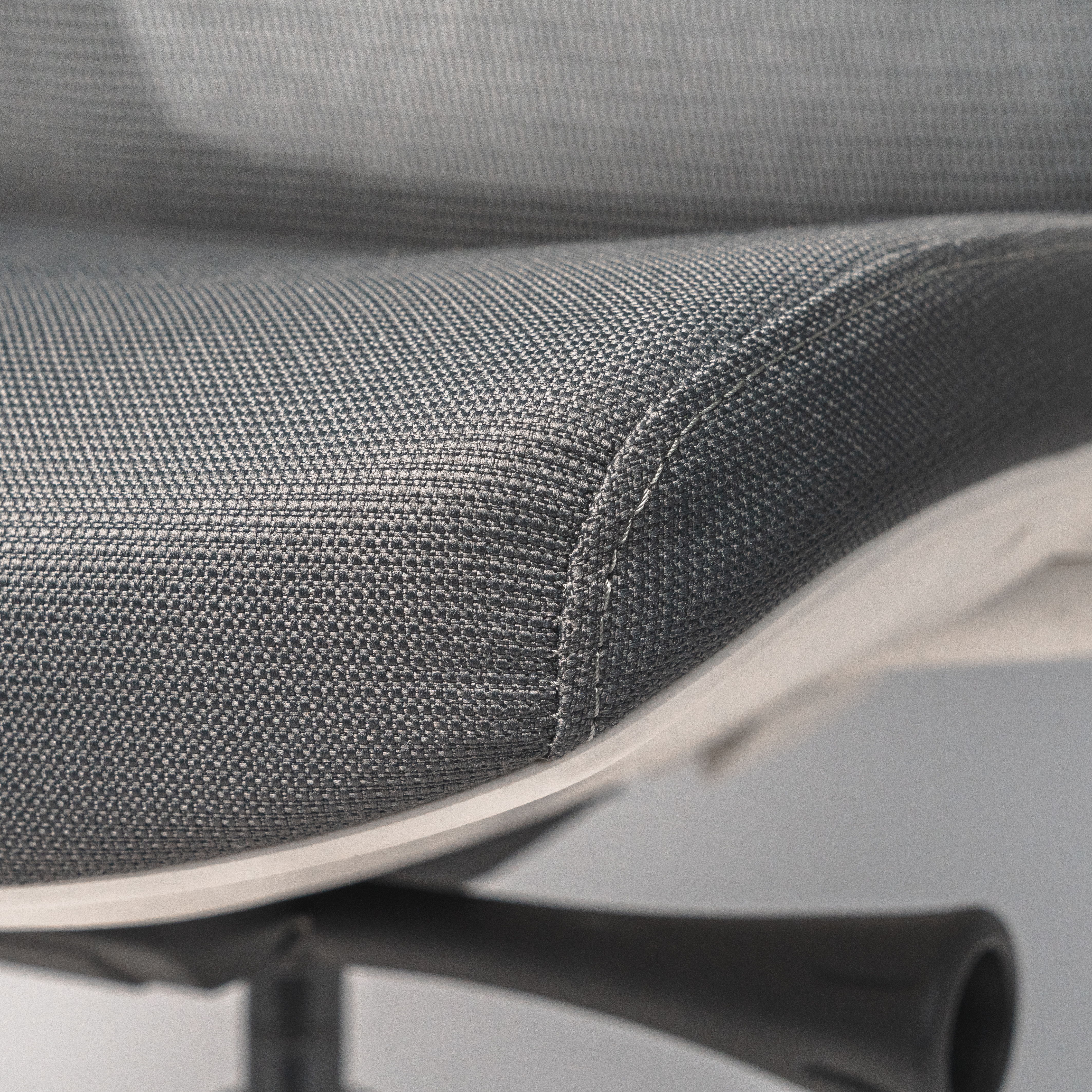 Close-up of a white, ergonomic office chair, Ergo ofinto | High-quality fabric and soft padding