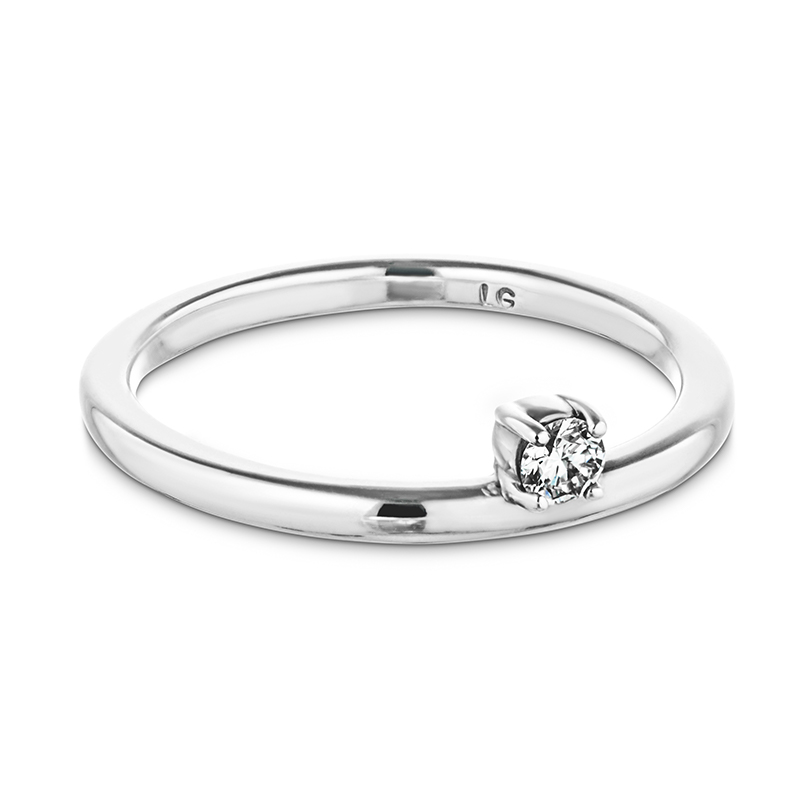 Asymmetrical white gold band with off-set diamond