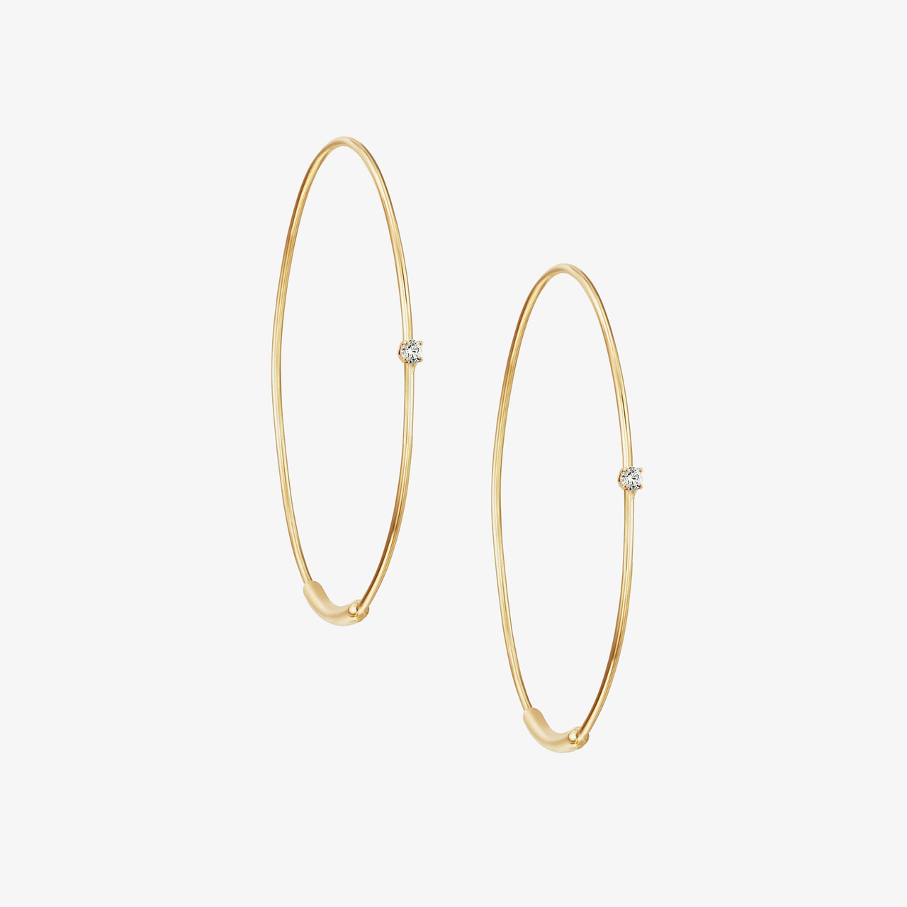 Pair of thin yellow gold hoop earrings with a polished finish for everyday wear.