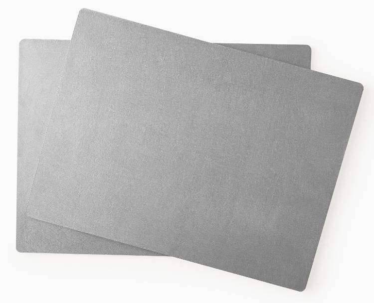 Two grey Misen Oven Steels stacked on top of each other, seen from directly overhead.