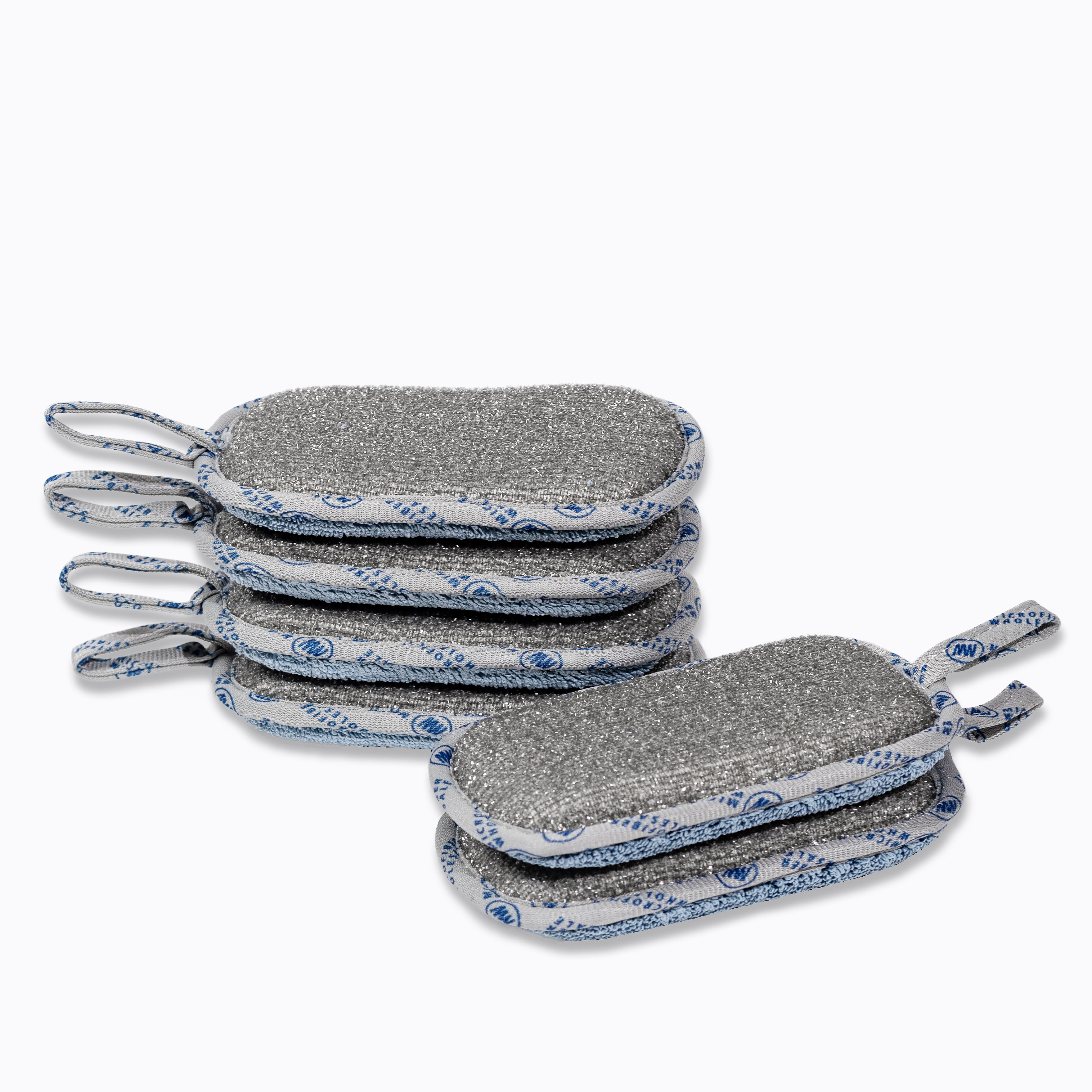 A stack of gray cleaning pads with blue trim.