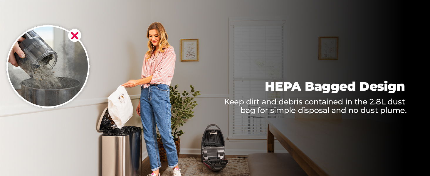 Woman using a vacuum cleaner with a HEPA bag design.
