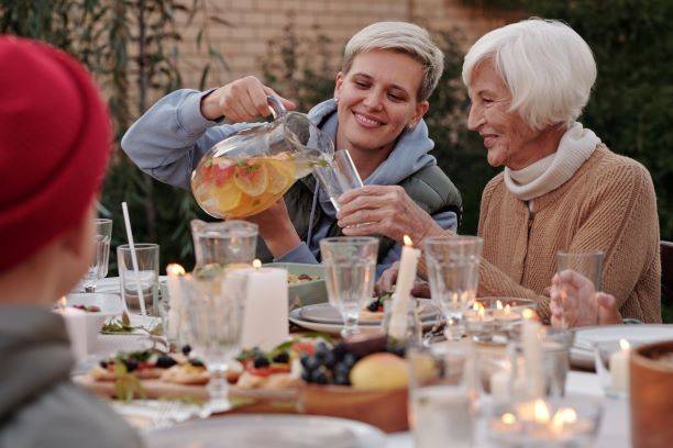 Cheerful People Eating Outside