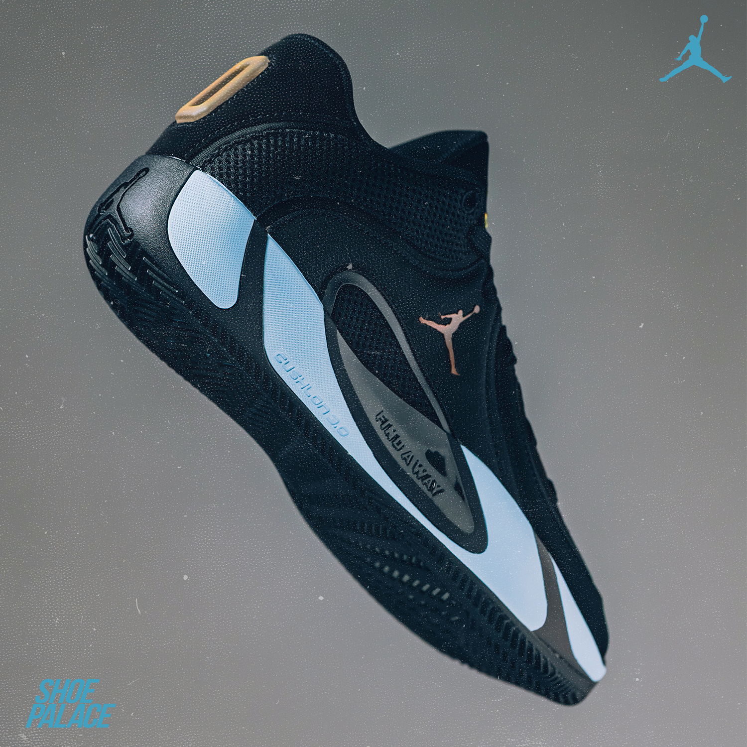 Black and white athletic shoe with a Jumpman logo.