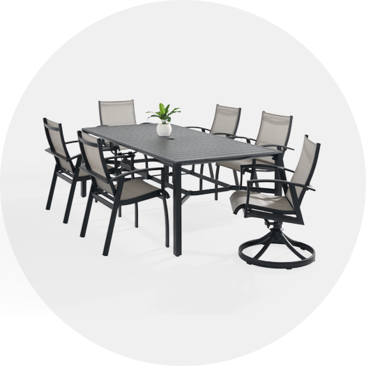 Outdoor dining set with a table and eight chairs.