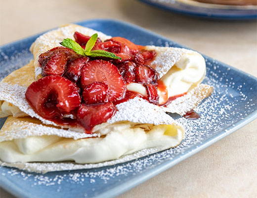Image of strawberries on crepes