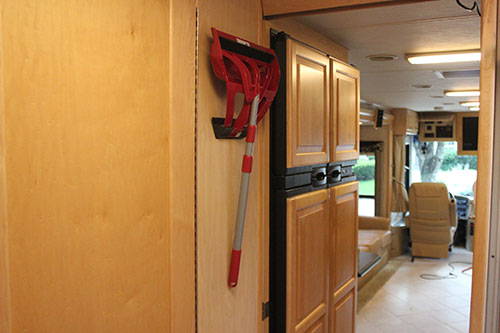 How Do You Store A Mop And Broom In An RV?