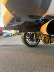 Low-angle rear undercarriage showing train horns and Bilstein shock on Brianna's Silverado photo 2