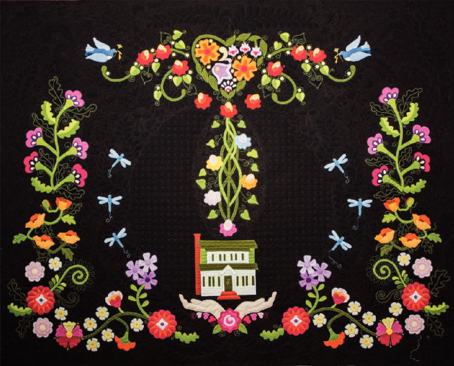 Colorful floral embroidery with birds and a house on a black background.
