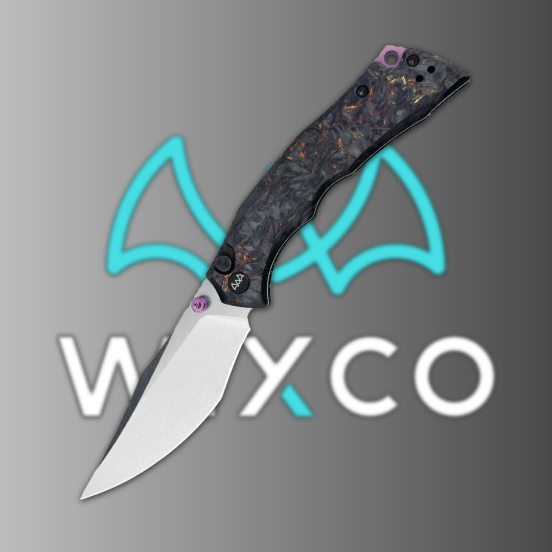 A folding knife with a patterned handle against a gray background.