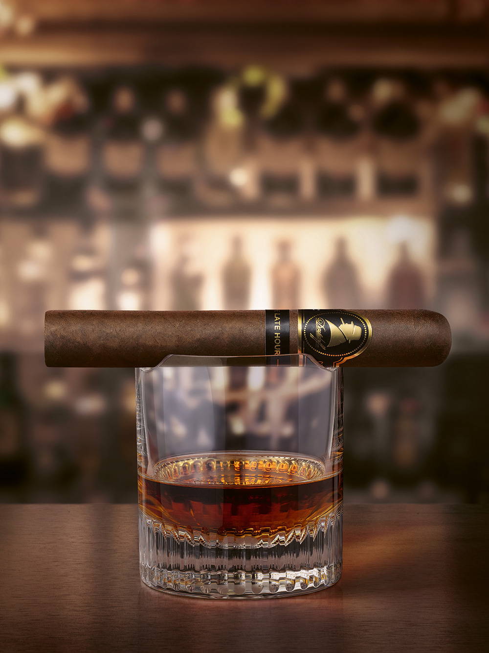 A Davidoff Winston Churchill «The Late Hour Series» cigar on a spirit glass.