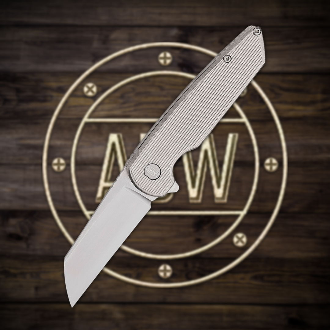 A sleek folding knife over a circular logo on a wooden background.