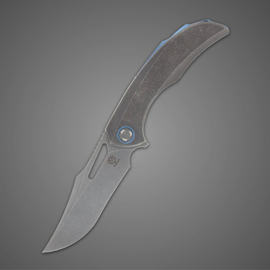 Folding knife with a metal blade and textured handle on a gray background.
