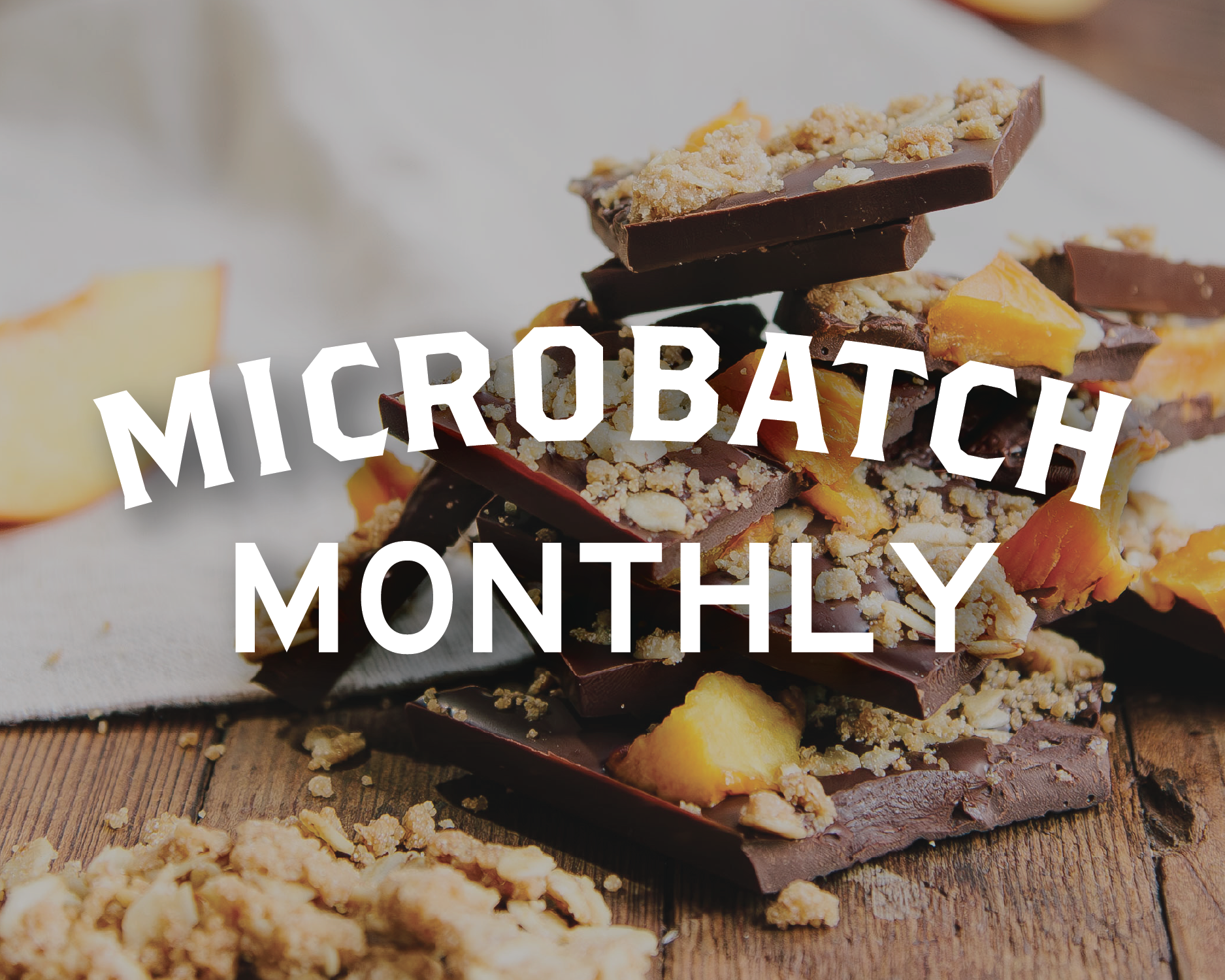 Peach cobbler crumble on the back of our microbatch monthly chocolate bar