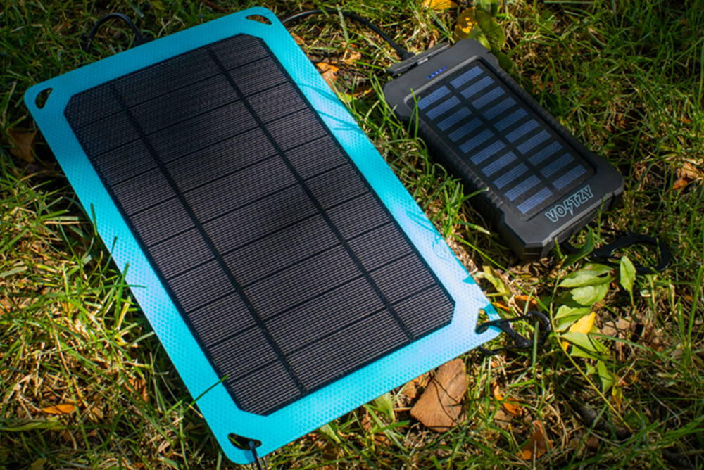 Voltzy Solar and Voltzy Powerbank charging in the sunlight