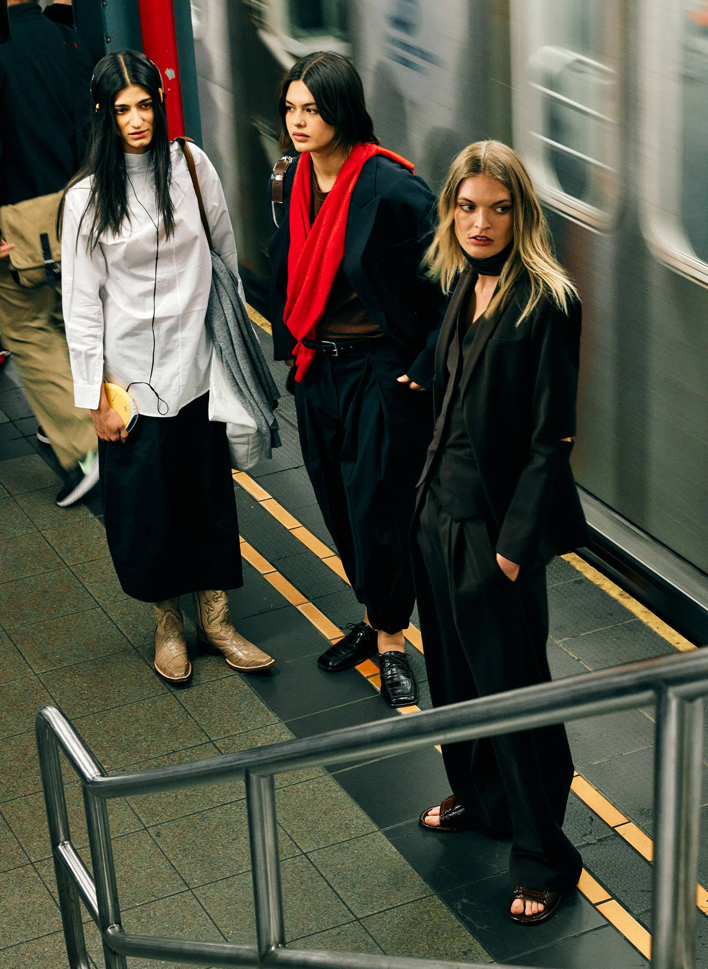 three models on nyc subway platform