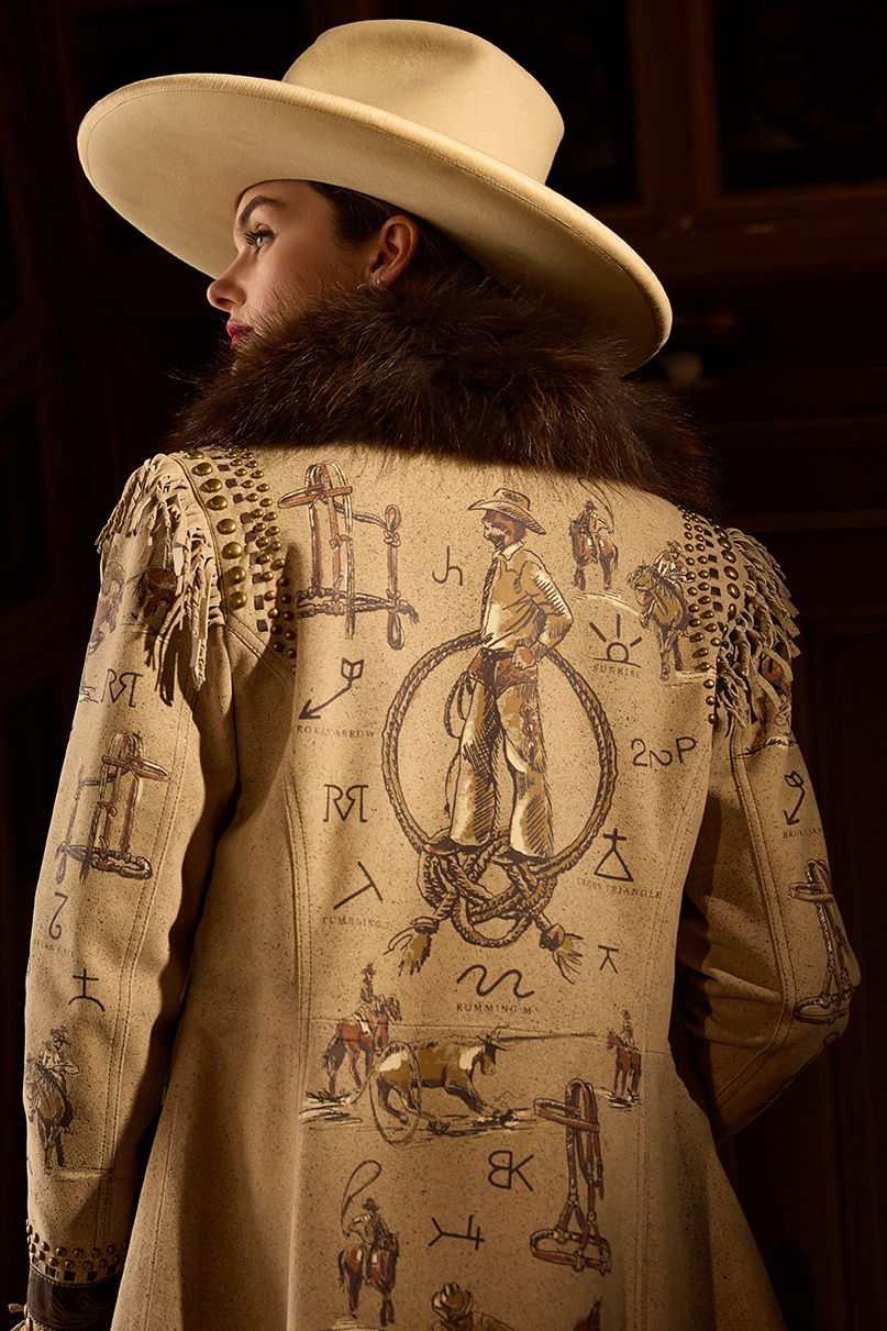 Kaylin wearing the Cowboy Work Jacket with a Vintage Double D Ranch hat.