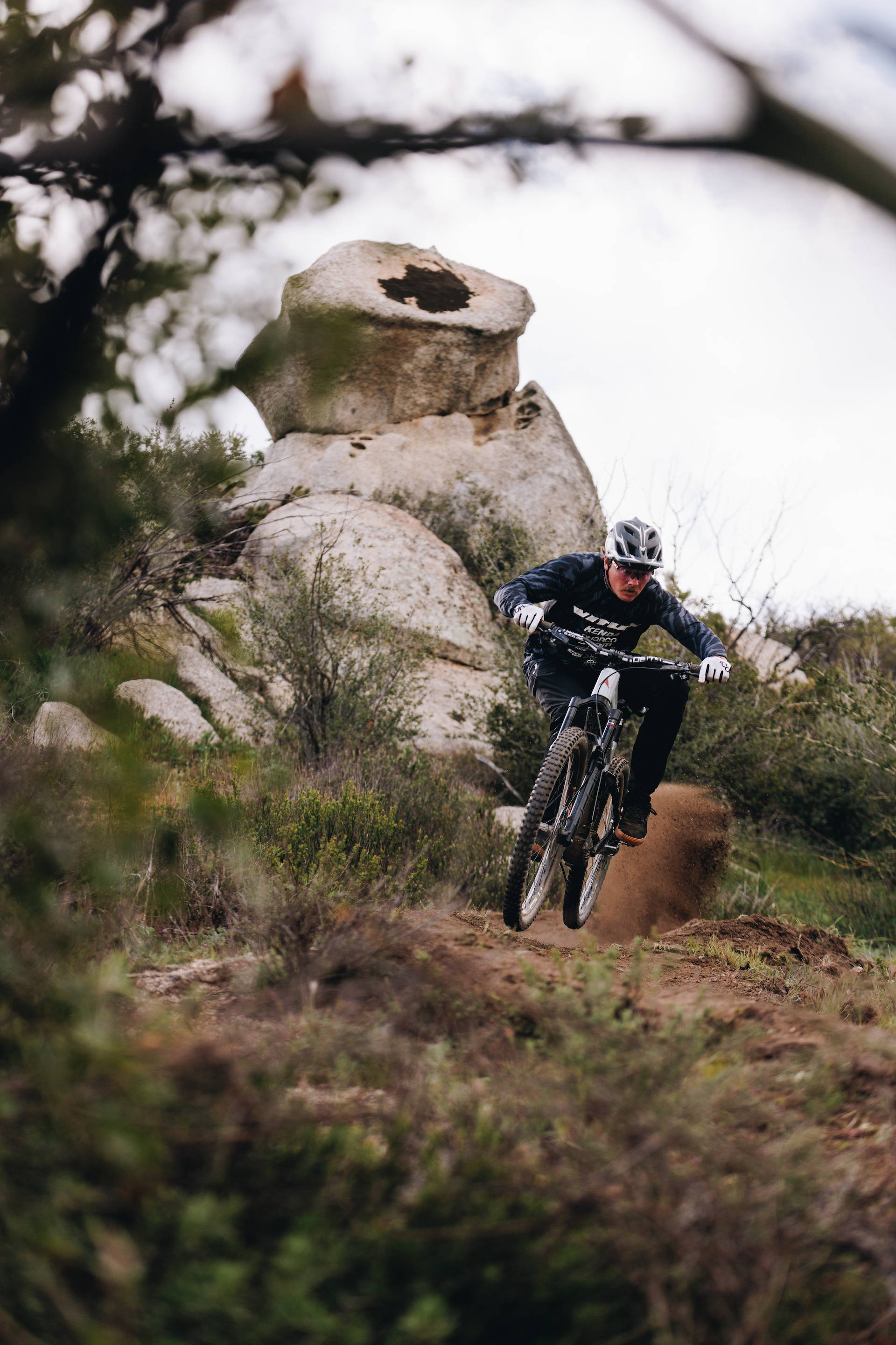 Kyle Strait riding a Vitus E-Sommet mountain bike