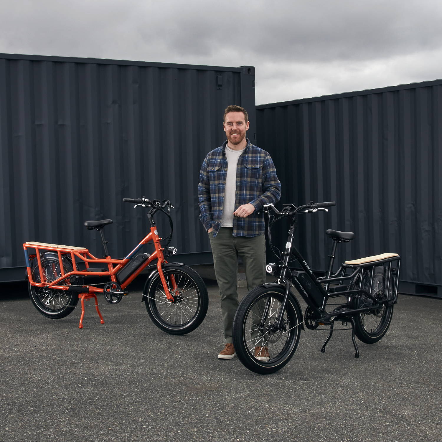  Mike Radenbaugh standing next to the RadWagon 4 Electric Cargo Bike