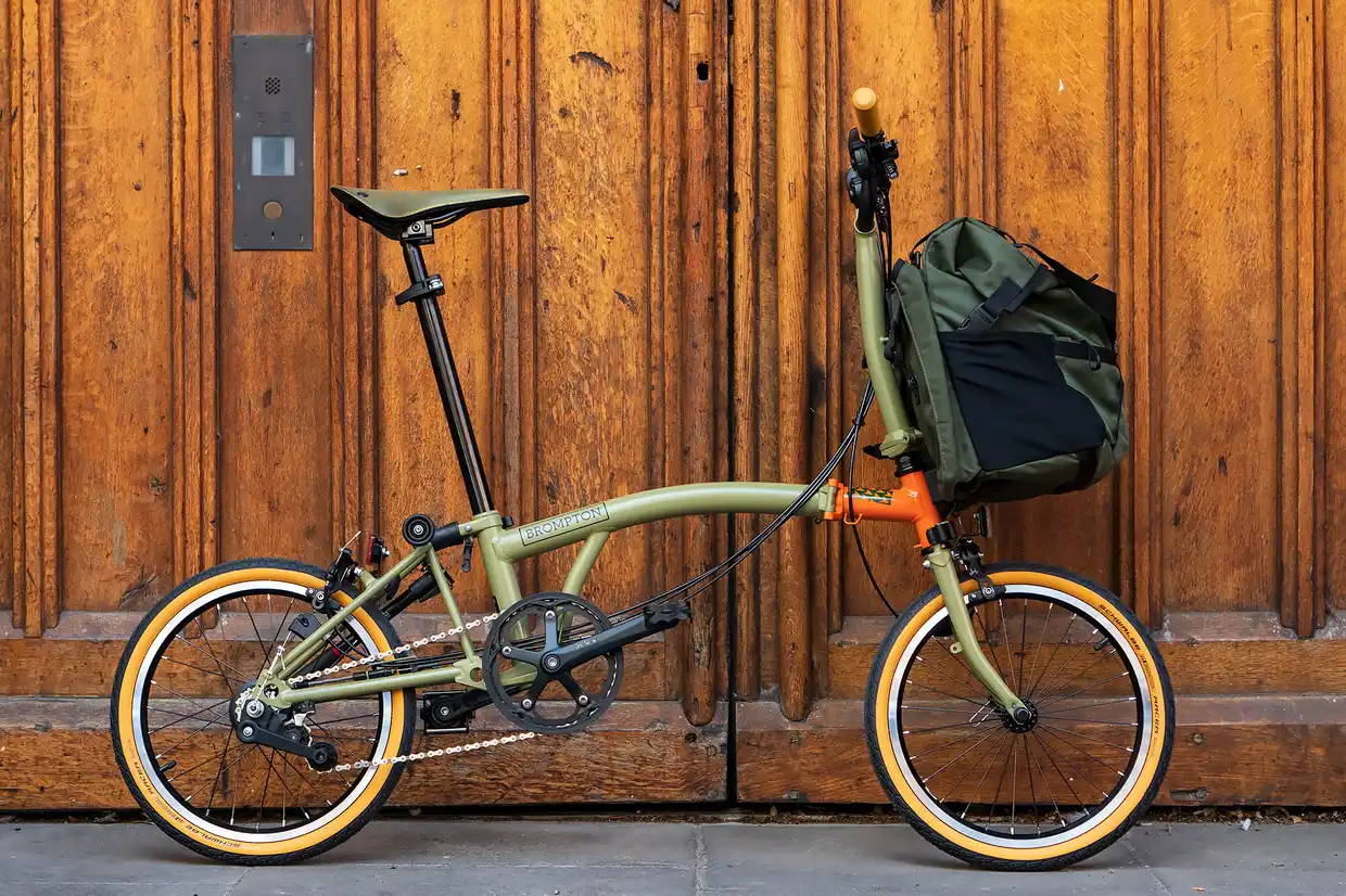 A Brompton Explore special edition folding bike with front bag